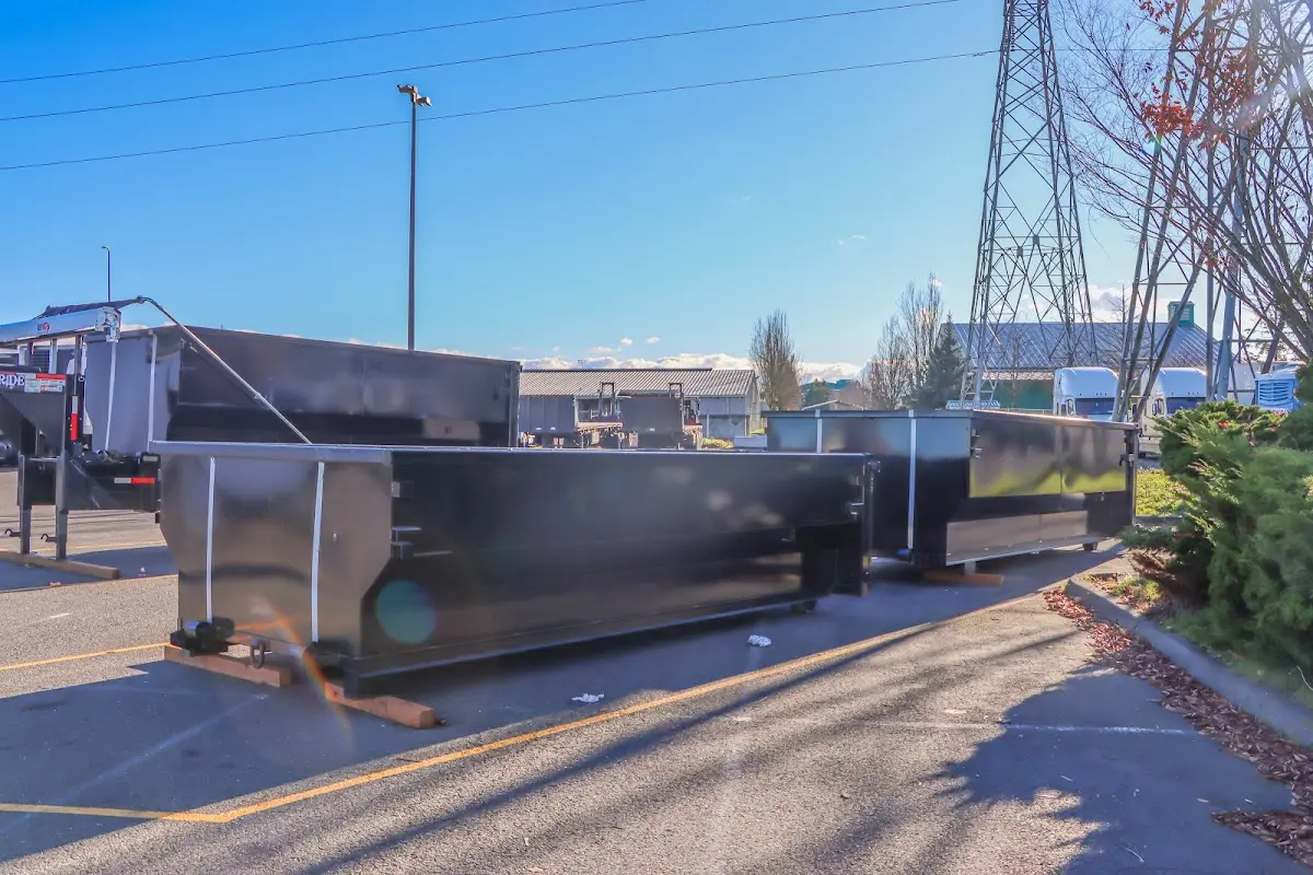 Roll-off dumpster ready for waste disposal at job site for Yard Waste Dumpster Rental in Quartz Hill